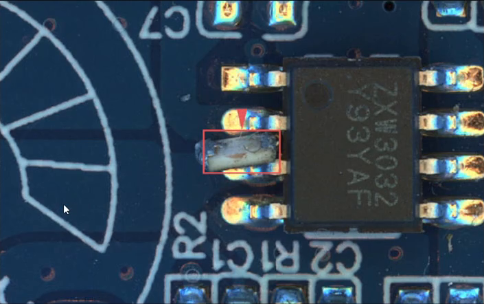 Foreign material beside an IC, with neighboring pins and the detection box